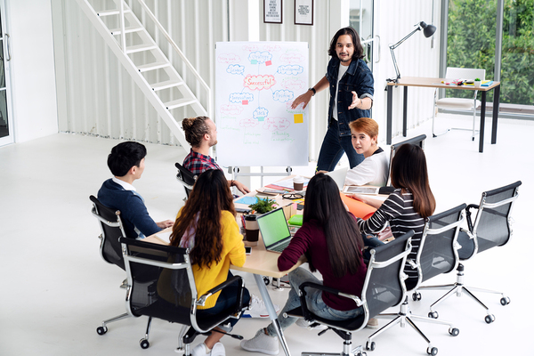 Group of co-workers discussing a project.